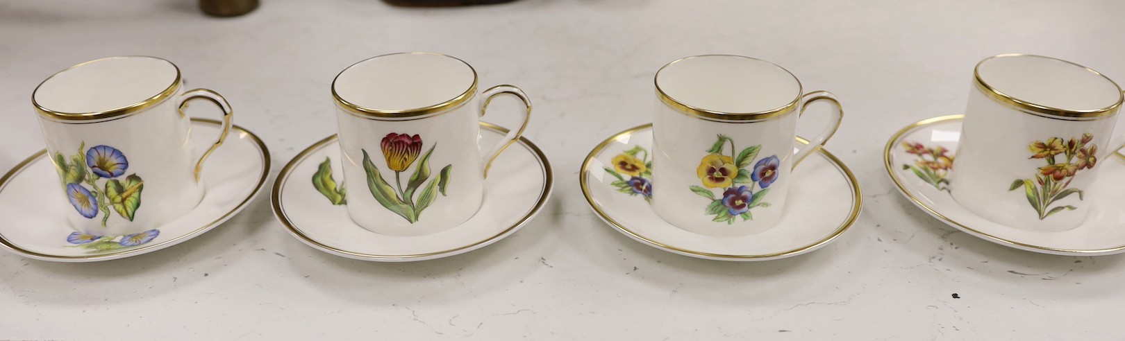 A Worcester botanical decorated coffee set.